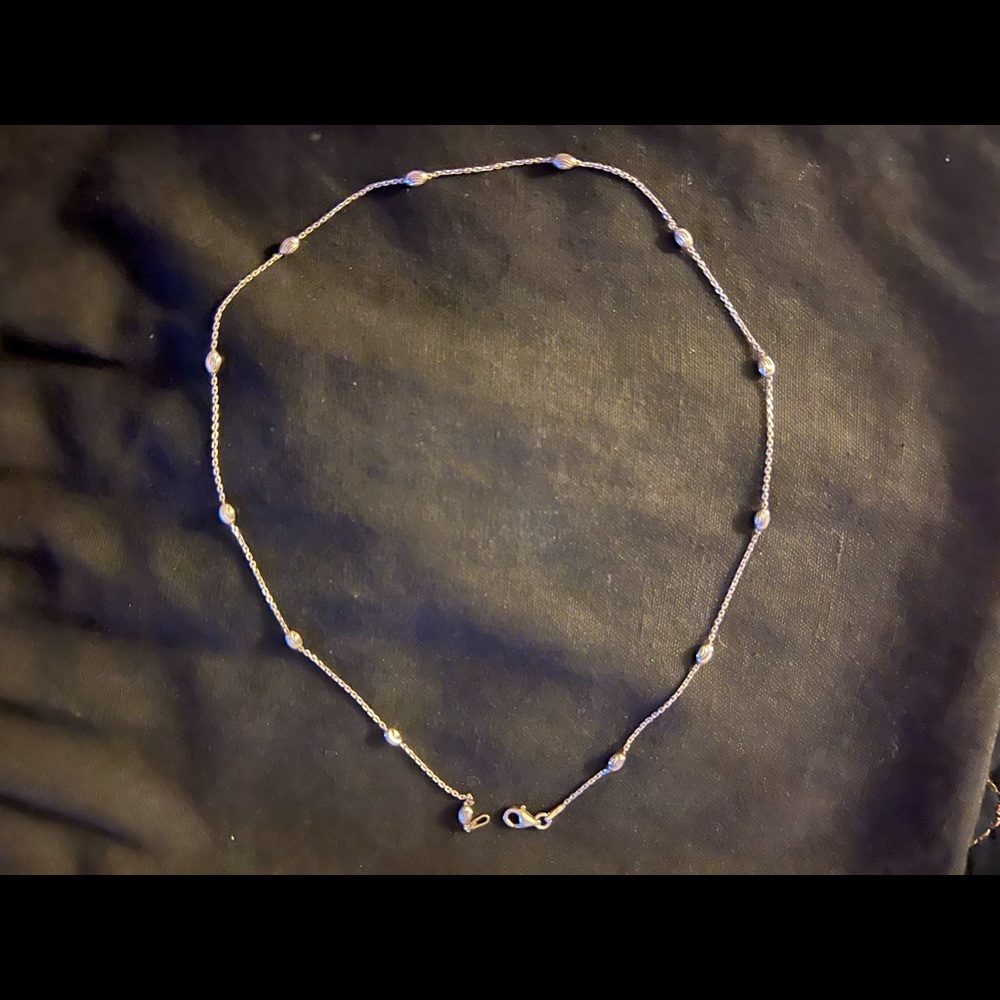 Sterling silver 18 inch necklace. Great accent piece.  Wear with multiple chains